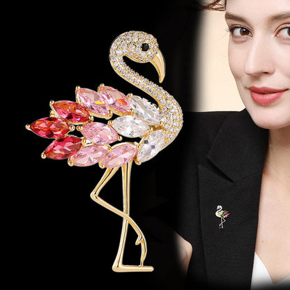Model wearing pink flamingo brooch