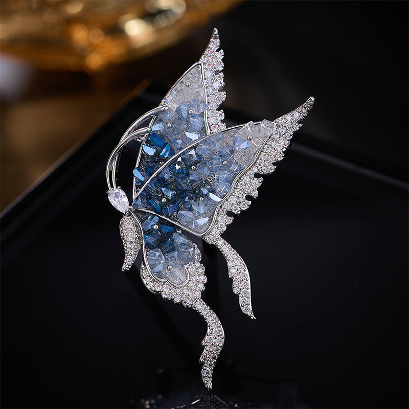 Vanessa-broche (Roze of blauwe zirkonia's)