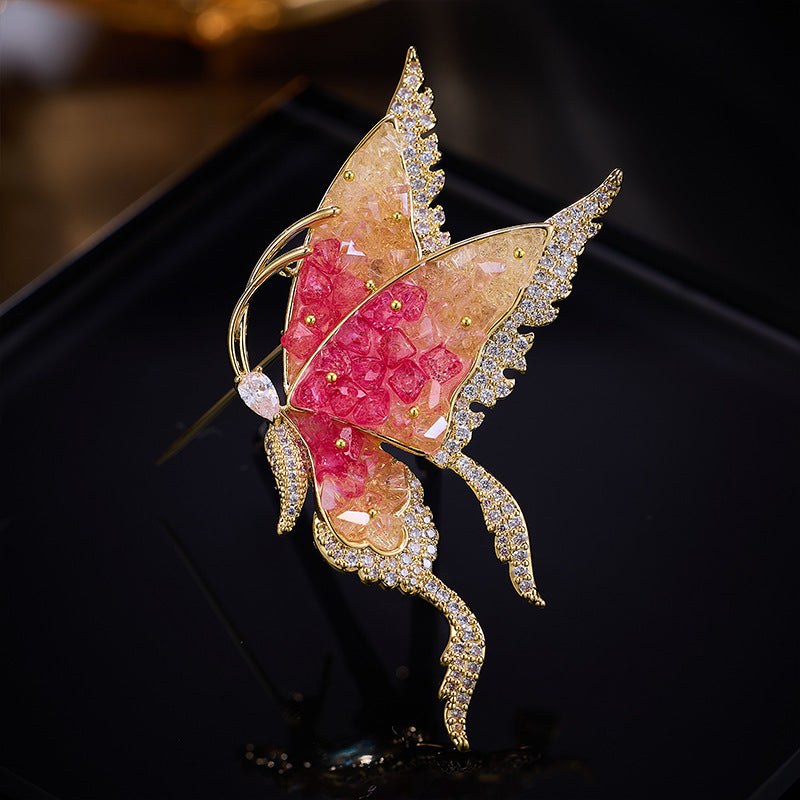 Vanessa-broche (Roze of blauwe zirkonia's)