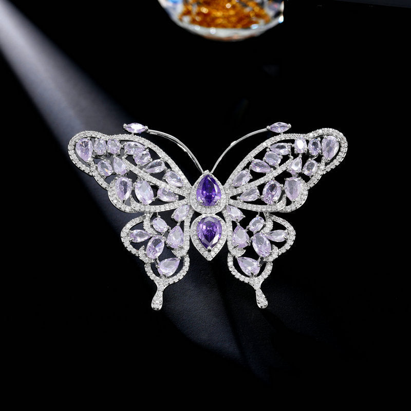 Purple zircon butterfly brooch with openwork filigree wings