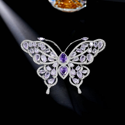Purple zircon butterfly brooch with openwork filigree wings