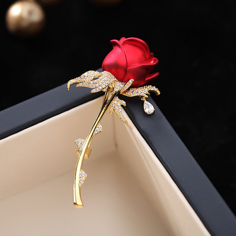 Red rose brooch presented in a gift box