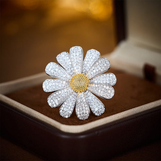 Zircon daisy brooch in jewelry box